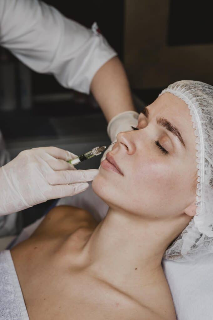 woman getting facial beauty treatment spa