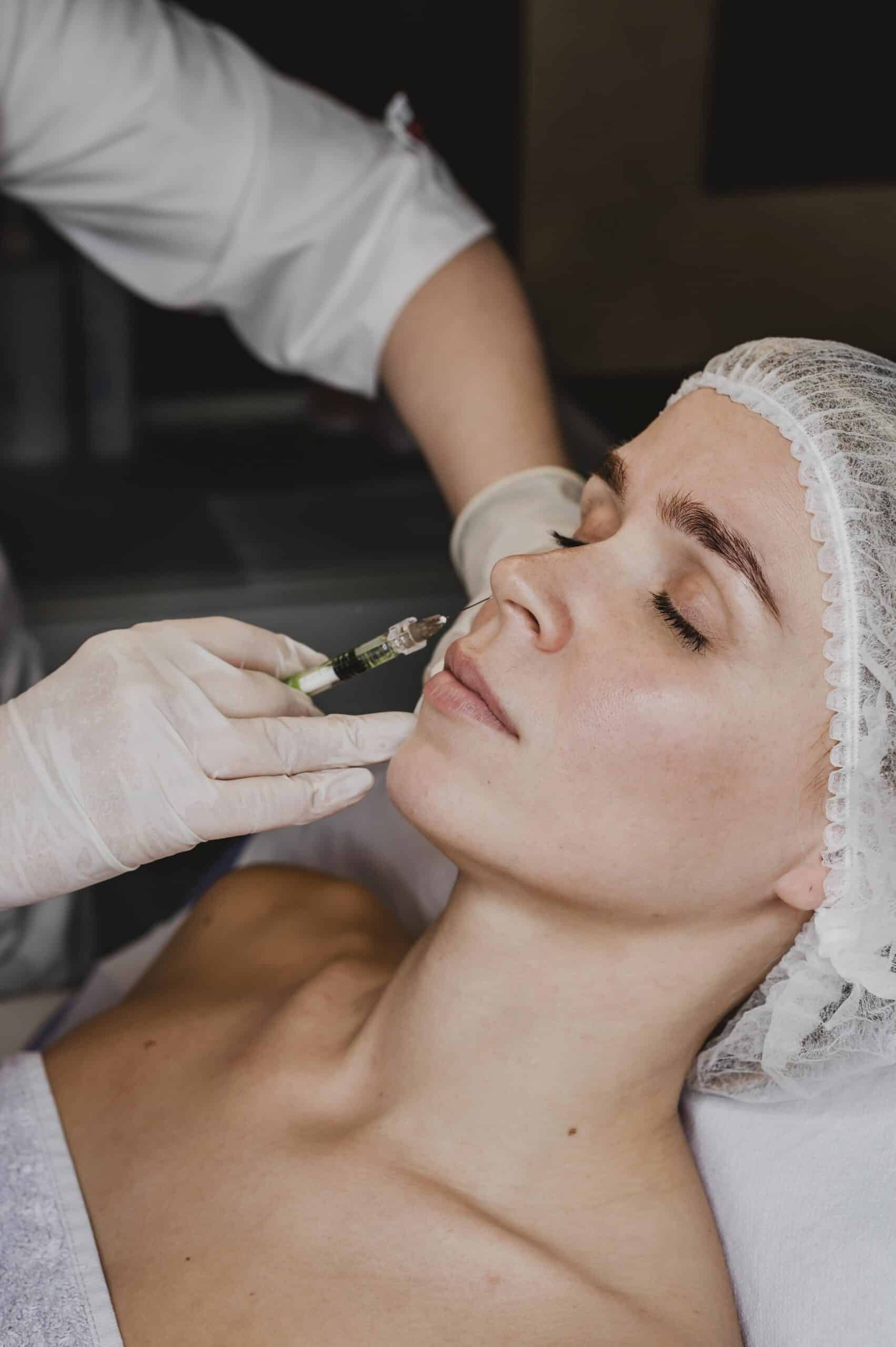 woman getting facial beauty treatment spa